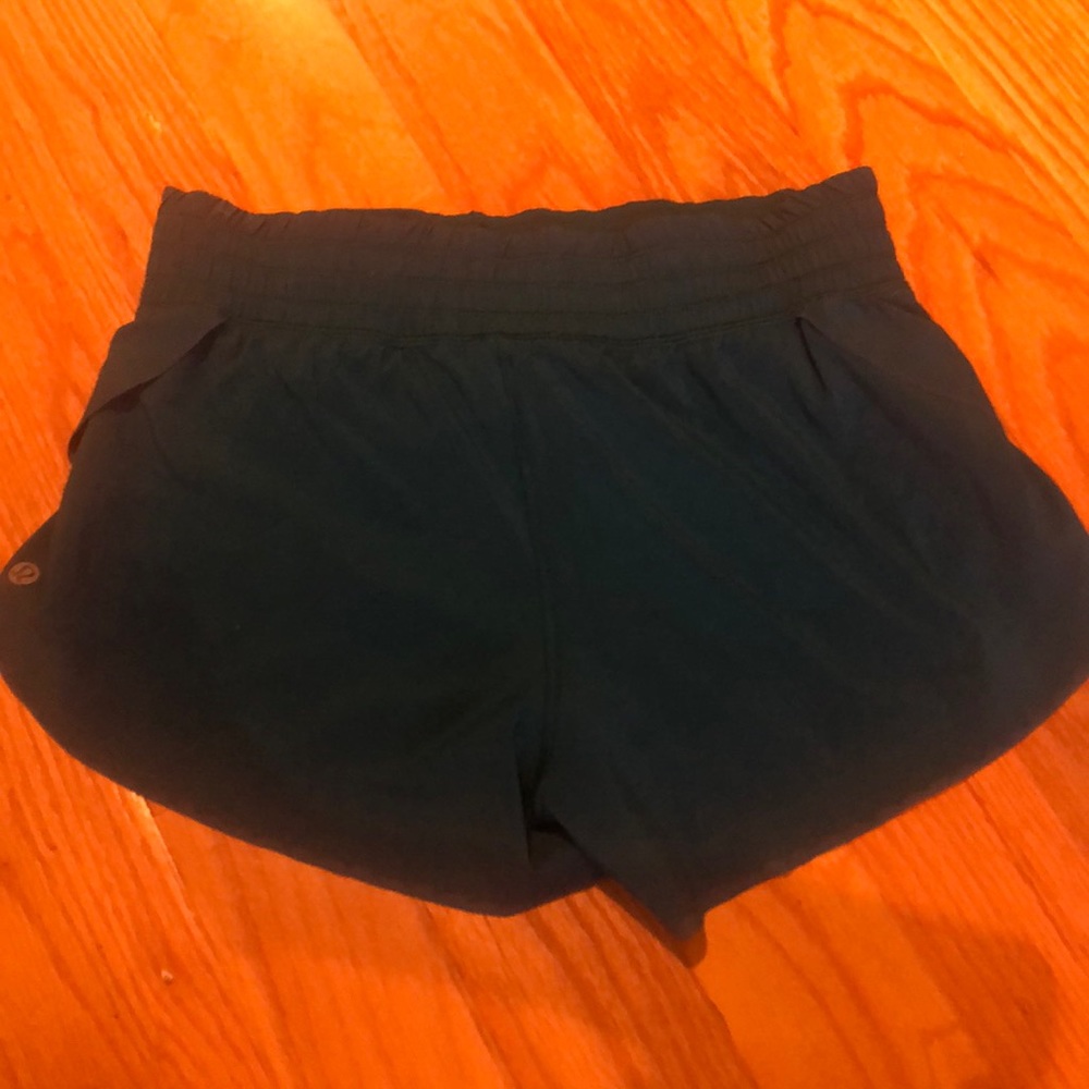 Teal Tracker Shorts with an eyelet trim